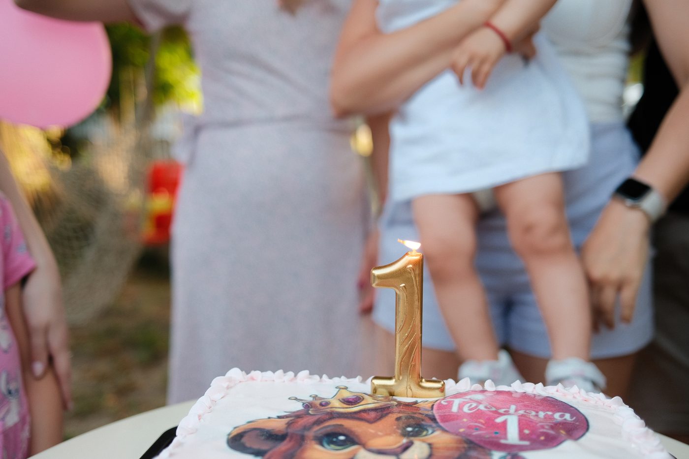 Children enjoying a birthday party with cake and decorations